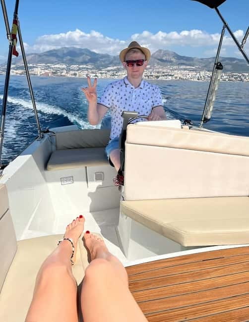 Benalmadena: Boat Rental with No License Required - Taking the controls off Benalmádena