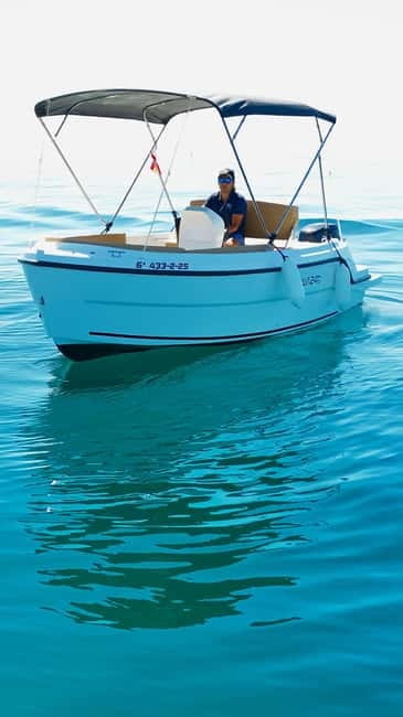 Benalmádena: license-Free Rent Boat for Dolphin Watching - Weather, sea conditions, and turning back