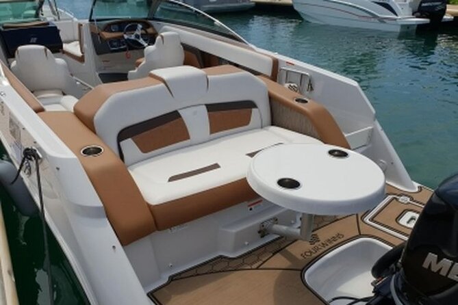 FourWinns HD240 boat rental for 10 people 4 hours - Cruising toward Maro-Cerro Gordo and Nerja