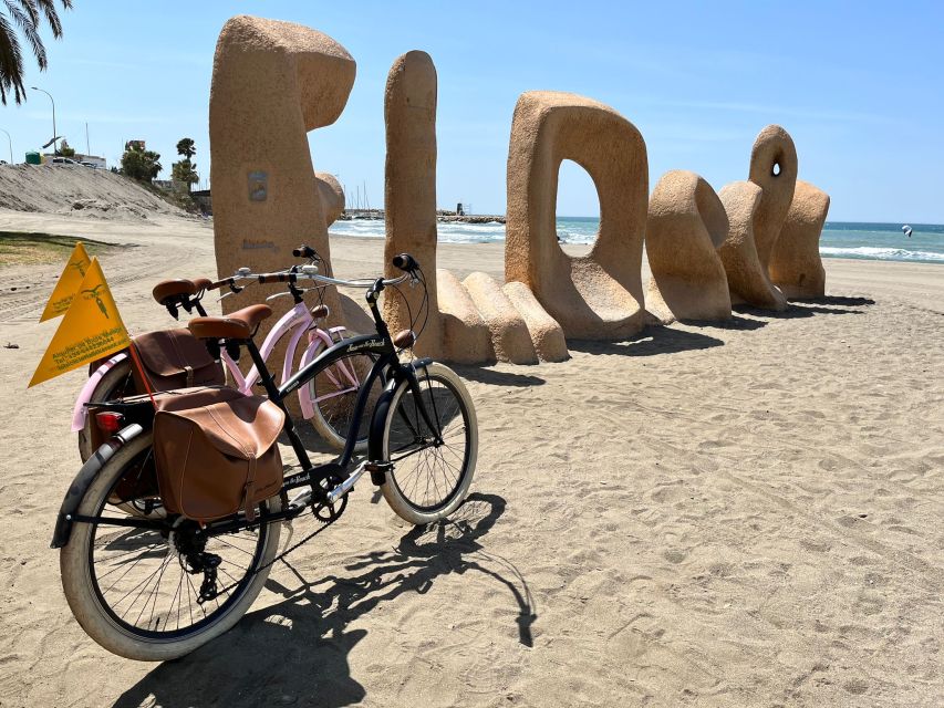 Malaga: Bike Rental for City Discovery Route & Beaches - Starting at La Malagueta with a bike and a map