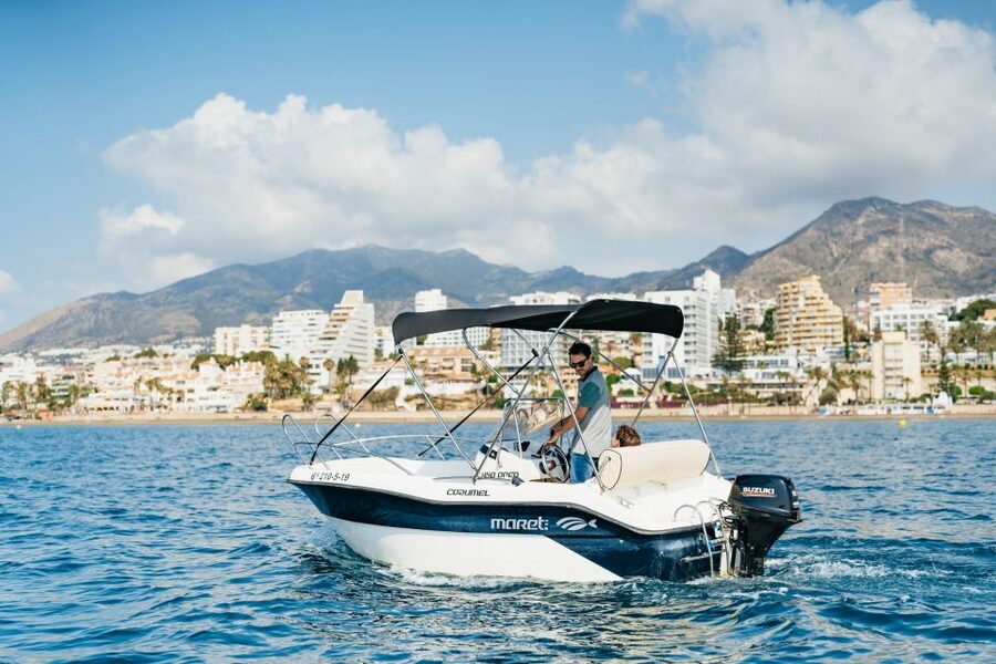 Malaga: Boat Rental without a License for Dolphin Watching - Taking the wheel off Benalmádena