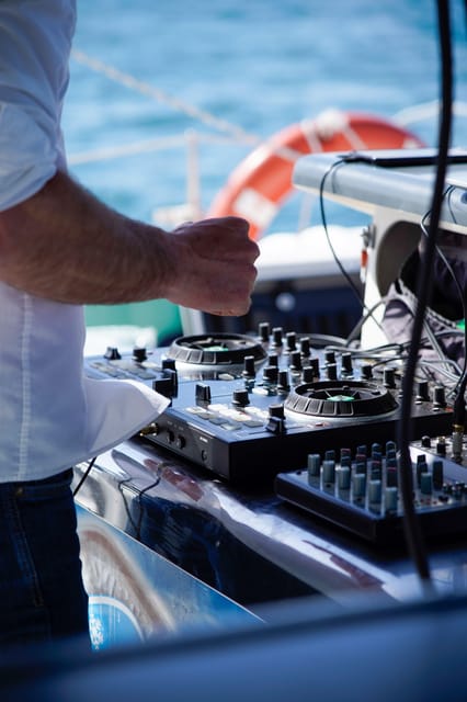 Malaga: Catamaran Sailing Cruise with Swimming & Optional DJ - Drinks, sangria, and the onboard bar