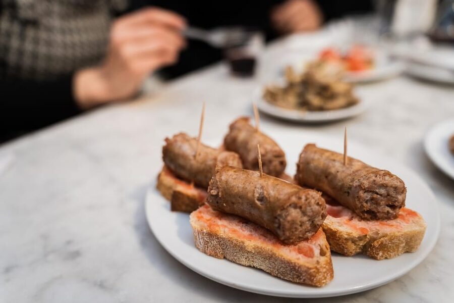 Malaga: Food Tour with Local Guide, Tapas, and Drinks - Pescadito frito and Málaga’s seafood tradition