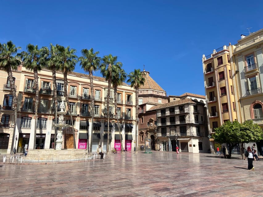 Malaga: Old Tour Walking Tour w/Cathedral & Picasso Museum - Walking Larios Street toward the old center