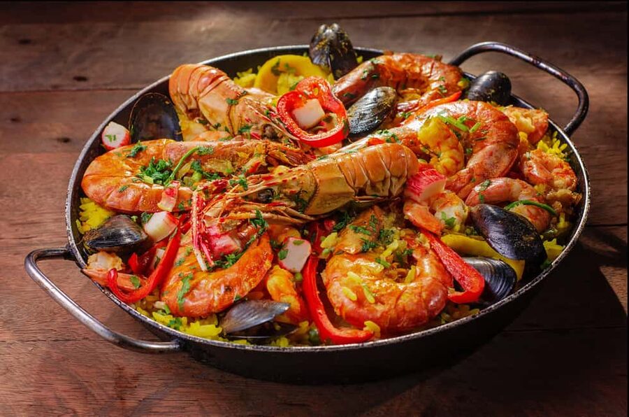 Malaga: Paella and Tapas Tour with The Best Flamenco Show - Walking through Malaga’s historic center
