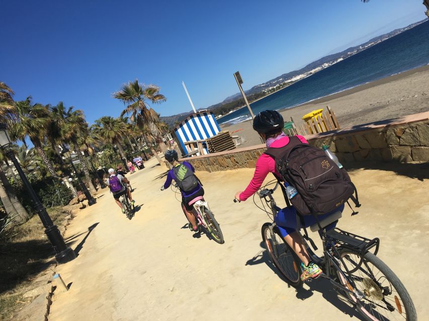 Malaga: Premium Guided Bike Tour - Along the beach boardwalk