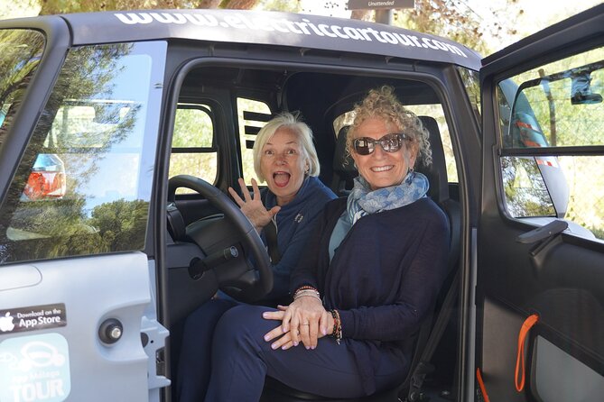Málaga Sunset & Night Tour by Electric Car - Climbing toward Gibralfaro