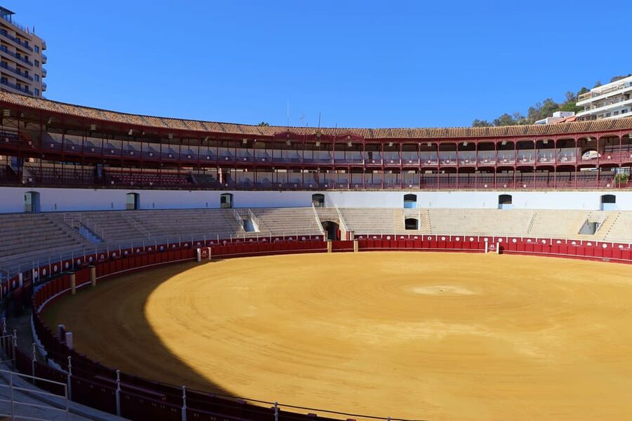 Malaga: Tour of Malagueta Bullring & Immersive Exhibition - Walking onto the sand of the arena