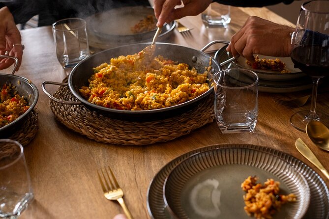 Paella Cooking Class with English Guide in Malaga - Building seafood paella, with alternatives available