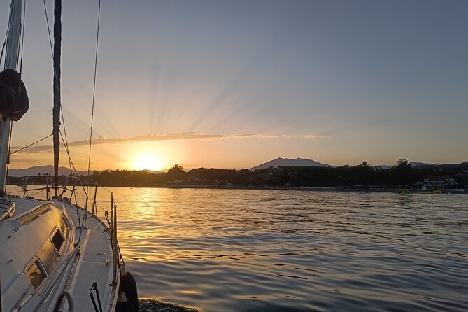 Sunset on Private Sailing boat Puerto Banus Marbella (10 pax) - Returning through Puerto Banús at dusk